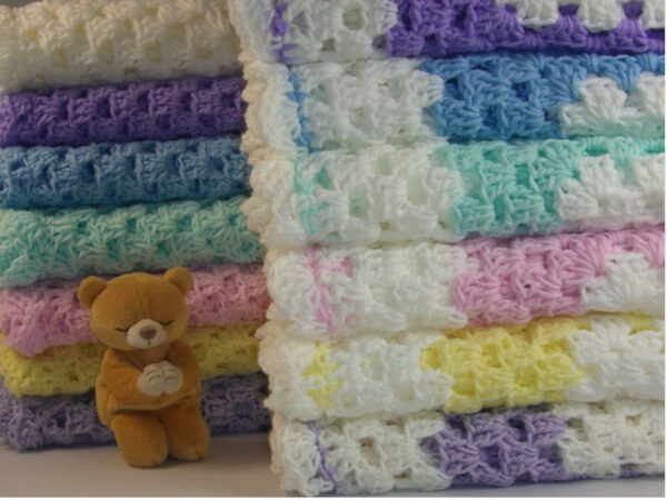 This baby blanket is made by hand using high quality 4 ply polyester yarn. It is very soft and warm. Size 30" x 30". Perfect size for keeping your special little one cozy in their car seat or stroller.